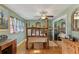 Bedroom with rustic wood bed frame and wood floors at 1614 King James Ct, Lakeland, FL 33813