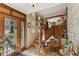 Entryway with wooden staircase, tile floors, and unique decor at 1614 King James Ct, Lakeland, FL 33813