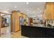 Spacious kitchen with light wood cabinets, granite countertops, and stainless steel appliances at 1614 King James Ct, Lakeland, FL 33813