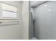 Clean shower with gray tile and a modern design at 1614 King James Ct, Lakeland, FL 33813