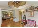 Sitting room with hardwood floors and access to bedroom at 1614 King James Ct, Lakeland, FL 33813