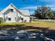 Large backyard with a mostly grassy area at 415 Avenue K Ne, Winter Haven, FL 33881