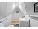 Small bathroom features a single sink vanity and a bath tub at 415 Avenue K Ne, Winter Haven, FL 33881
