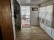 Sunroom with access to backyard patio at 415 Avenue K Ne, Winter Haven, FL 33881