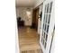Sunroom features tile flooring and French doors at 415 Avenue K Ne, Winter Haven, FL 33881