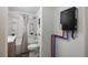 Clean bathroom with a tub, toilet and new water heater at 521 W Voorhis Ave, Deland, FL 32720