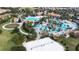 Large resort-style pool with beach volleyball court at 601 Drop Shot Dr, Davenport, FL 33896