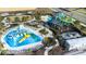 Resort-style water park with slides and a playground at 601 Drop Shot Dr, Davenport, FL 33896