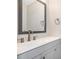 Modern bathroom with gray vanity and updated fixtures at 980 Canal View Blvd # G1, Port Orange, FL 32129