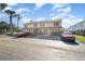 Front view of a two-story building with parking area at 980 Canal View Blvd # G1, Port Orange, FL 32129