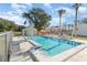 Community pool with surrounding patio and lounge chairs at 980 Canal View Blvd # G1, Port Orange, FL 32129