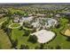 Community boasting resort-style pool, expansive green spaces, and a volleyball court at 1463 Myrtlewood St, Davenport, FL 33896