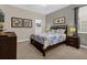 Bedroom with a queen-size bed and ample closet space at 1463 Myrtlewood St, Davenport, FL 33896