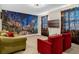 Game room featuring a Diagon Alley mural and two armchairs at 1463 Myrtlewood St, Davenport, FL 33896