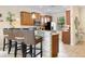 Kitchen with granite countertops and a breakfast bar at 1463 Myrtlewood St, Davenport, FL 33896
