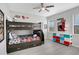 Superhero themed bunk beds in a playful bedroom at 2541 Shanti Dr, Kissimmee, FL 34746