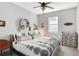 King-size bed with eclectic decor in a spacious bedroom at 2541 Shanti Dr, Kissimmee, FL 34746