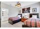 bedroom with twin beds, pirate theme, and ensuite bathroom at 2541 Shanti Dr, Kissimmee, FL 34746