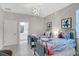 Two twin beds with Frozen bedding in a bright bedroom at 2541 Shanti Dr, Kissimmee, FL 34746
