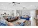 Spacious living room with comfortable seating and access to the kitchen at 2541 Shanti Dr, Kissimmee, FL 34746