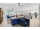Open floor plan with living room, kitchen, and dining area at 2541 Shanti Dr, Kissimmee, FL 34746