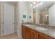 Double vanity bathroom with granite countertops at 501 Lasso Dr, Kissimmee, FL 34747