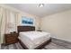King bedroom with wood floors and calming decor at 501 Lasso Dr, Kissimmee, FL 34747
