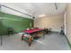 Fun game room with pool table, foosball, and arcade game at 501 Lasso Dr, Kissimmee, FL 34747