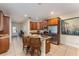 Kitchen with island, granite counters & stainless steel appliances at 501 Lasso Dr, Kissimmee, FL 34747