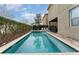 Inviting rectangular pool with spa and patio at 501 Lasso Dr, Kissimmee, FL 34747