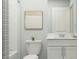 Simple bathroom with white vanity, toilet, and shower/tub combo at 1307 Inkberry Cir, Deland, FL 32720