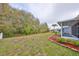 Private backyard with fenced area and mature trees at 3379 Fiddle Leaf Way, Lakeland, FL 33811