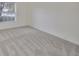 Well-lit bedroom with carpet and large window at 3379 Fiddle Leaf Way, Lakeland, FL 33811