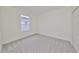 Bright bedroom with plush carpet and ample closet space at 3379 Fiddle Leaf Way, Lakeland, FL 33811