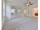 Spacious bedroom with access to bathroom and another room at 3379 Fiddle Leaf Way, Lakeland, FL 33811