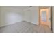 Bedroom with carpet flooring and access to a hallway at 3379 Fiddle Leaf Way, Lakeland, FL 33811