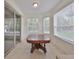 Sunlit breakfast nook with sliding glass doors leading to the outdoors at 3379 Fiddle Leaf Way, Lakeland, FL 33811