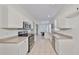 Modern kitchen with stainless steel appliances and ample counter space at 3379 Fiddle Leaf Way, Lakeland, FL 33811