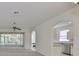Spacious living room with an open floor plan and access to a lanai at 3379 Fiddle Leaf Way, Lakeland, FL 33811