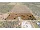 Aerial view of a home on a large lot with surrounding farmland at 6085 Lightsey Rd, Fort Meade, FL 33841