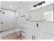 Modern bathroom with white cabinets and marble shower at 6085 Lightsey Rd, Fort Meade, FL 33841
