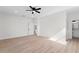 Spacious bedroom with hardwood floors and access to bathroom at 6085 Lightsey Rd, Fort Meade, FL 33841