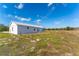 Single story home with metal roof and large yard at 6085 Lightsey Rd, Fort Meade, FL 33841