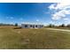 Newly built home with grassy yard at 6085 Lightsey Rd, Fort Meade, FL 33841