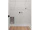 Laundry closet with shelving and hookups at 6085 Lightsey Rd, Fort Meade, FL 33841