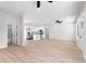 Open living room with kitchen and stainless steel appliances at 6085 Lightsey Rd, Fort Meade, FL 33841
