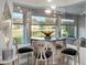 Breakfast nook with stylish decor and views to the outdoors at 7833 Freestyle Ln, Winter Garden, FL 34787