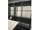 Spacious walk-in closet with custom shelving and hanging rods at 7833 Freestyle Ln, Winter Garden, FL 34787
