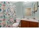 Bathroom includes a toilet, vanity, and shower at 1011 Susan Dr, Lake Wales, FL 33853