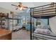 Bedroom with bunk beds and a desk at 1011 Susan Dr, Lake Wales, FL 33853